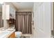 Guest bathroom with double vanity and shower at 1312 Landeros Ln, The Villages, FL 32159
