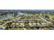 Aerial perspective of community near golf course and lake at 1312 Landeros Ln, The Villages, FL 32159