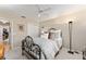 Guest bedroom with full bed and decorative accents at 1312 Landeros Ln, The Villages, FL 32159