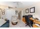 Home office with a desk, comfortable chair and storage at 1312 Landeros Ln, The Villages, FL 32159