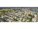 Wide aerial view of the community and surrounding landscape at 1312 Landeros Ln, The Villages, FL 32159