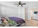 Main bedroom with a queen bed and en-suite bathroom access at 2030 Leisure Dr, Winter Haven, FL 33881