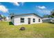 Newly renovated single story home with black front door at 2030 Leisure Dr, Winter Haven, FL 33881