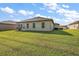 Spacious backyard with a large grassy area at 17257 Se 113Th Ave, Summerfield, FL 34491