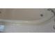Oval bathtub with tile surround at 3425 Dixon Ln, The Villages, FL 32162