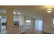 Open kitchen with island and stainless steel appliances at 3425 Dixon Ln, The Villages, FL 32162
