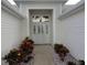 Front entry with walkway and landscaping at 3425 Dixon Ln, The Villages, FL 32162