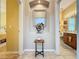 Elegant hallway with built-in niche and decorative accents at 4088 Kingsley St, Clermont, FL 34711