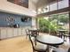 Community coffee bar with tables, chairs, and large windows at 4088 Kingsley St, Clermont, FL 34711