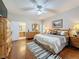 Spacious main bedroom with king-size bed and ensuite bathroom access at 4088 Kingsley St, Clermont, FL 34711