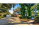 Home exterior showcasing landscaping and driveway at 3064 Windham Dr, Eustis, FL 32726