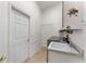 Laundry room with washer, dryer, and utility sink at 3064 Windham Dr, Eustis, FL 32726