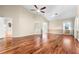 Bright and airy bedroom with hardwood floors and lots of natural light at 3064 Windham Dr, Eustis, FL 32726