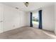 Spacious bedroom with neutral walls and carpeted floors at 3064 Windham Dr, Eustis, FL 32726