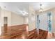 Spacious living room showcasing hardwood floors and an open floor plan at 3064 Windham Dr, Eustis, FL 32726
