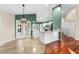 Bright dining area with chandelier and view to living room at 3064 Windham Dr, Eustis, FL 32726
