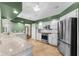 Modern kitchen with stainless steel appliances and granite countertops at 3064 Windham Dr, Eustis, FL 32726