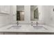 Modern bathroom with dual sinks and updated fixtures at 3064 Windham Dr, Eustis, FL 32726