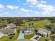 Bird's-eye view of a mobile home nestled in a golf course community at 25504 Belle Alliance, Leesburg, FL 34748