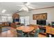 Casual dining area with a round table and chairs, located near the kitchen at 25504 Belle Alliance, Leesburg, FL 34748