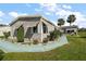 Exterior view showcasing the home's side and landscaping at 25504 Belle Alliance, Leesburg, FL 34748