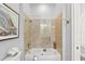 Bathroom with shower/tub combo, tile surround, and glass enclosure at 5096 Greens Dr, Lady Lake, FL 32159