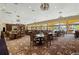 Spacious community room with elegant furnishings and large windows at 5279 Bowline Ct, Oxford, FL 34484
