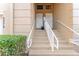 Front entry of townhome with a stairway leading to the front door at 5279 Bowline Ct, Oxford, FL 34484