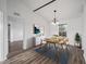 Dining area with hardwood floors and a modern dining set at 2101 Sw 3Rd St, Ocala, FL 34471