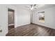 Well-lit bedroom with wood-look floors and ceiling fan at 2101 Sw 3Rd St, Ocala, FL 34471