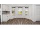 Breakfast nook with bay window and hardwood floors at 2101 Sw 3Rd St, Ocala, FL 34471