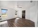Bright bedroom with wood-look floors and ceiling fan at 2101 Sw 3Rd St, Ocala, FL 34471