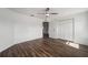 Spacious bedroom featuring wood-look floors and ample closet space at 2101 Sw 3Rd St, Ocala, FL 34471