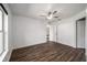 Spacious bedroom with wood-look floors and ceiling fan at 2101 Sw 3Rd St, Ocala, FL 34471