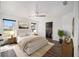 Main bedroom with wood floors and ensuite bathroom at 2101 Sw 3Rd St, Ocala, FL 34471