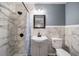 Bathroom with shower/tub combo, vanity, and wood-look floors at 2101 Sw 3Rd St, Ocala, FL 34471