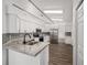 Updated kitchen with island and stainless steel appliances at 2101 Sw 3Rd St, Ocala, FL 34471