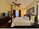 Spacious bedroom with king-size bed and ample closet space at 119 Crescent Moon Dr, Groveland, FL 34736