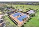 Well-lit community tennis courts at 119 Crescent Moon Dr, Groveland, FL 34736