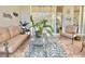 Cozy patio with seating area, perfect for relaxing at 119 Crescent Moon Dr, Groveland, FL 34736