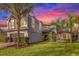 Two-story house with gray siding and landscaping at 13412 Fox Glove St, Winter Garden, FL 34787