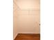 Walk-in closet with wire shelving and a hanging rod at 1836 Ridge Valley St, Clermont, FL 34711