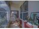 Relaxing screened porch, perfect for morning coffee at 5000 Portsmouth St, Tavares, FL 32778
