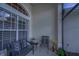 Charming front porch with seating and landscaping at 5000 Portsmouth St, Tavares, FL 32778