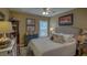 Comfortable bedroom with a king-size bed and plenty of natural light at 5000 Portsmouth St, Tavares, FL 32778