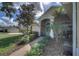 House exterior with walkway and landscaping at 5000 Portsmouth St, Tavares, FL 32778