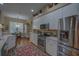 Updated kitchen featuring stainless steel appliances and ample counter space at 5000 Portsmouth St, Tavares, FL 32778