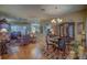 Spacious dining room with hardwood floors and a china cabinet at 5000 Portsmouth St, Tavares, FL 32778