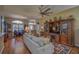 Spacious living area featuring hardwood floors and ample natural light at 5000 Portsmouth St, Tavares, FL 32778