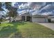 One story house with a large yard at 5000 Portsmouth St, Tavares, FL 32778